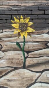 Close up of sunflower in Beginning from an End mural